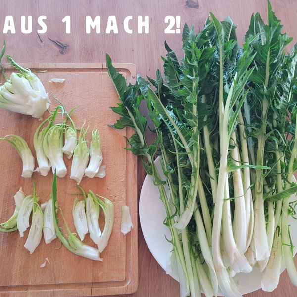 KI generiert: Das Bild zeigt geschnittenen Löwenzahn auf einem Schneidebrett und daneben ein Bündel Löwenzahn auf einem Teller. Darüber steht der Schriftzug "AUS 1 MACH 2!".